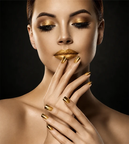 Luxury beauty model with gold makeup